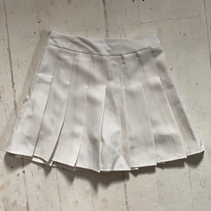 White pleated mini skirt